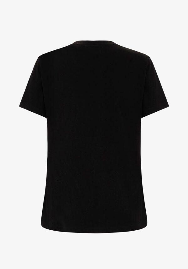T-shirt con bottoni