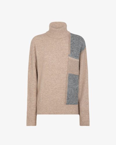 Dolcevita con taschino e inseri lurex