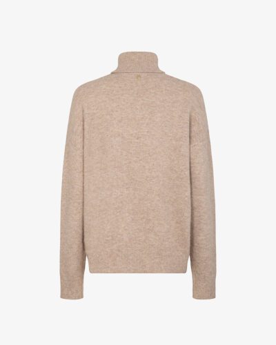 Dolcevita con taschino e inseri lurex